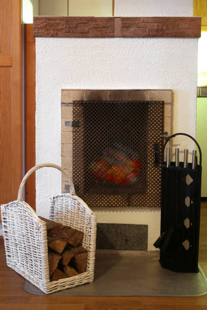 istock Burning fireplace in cottage, a vertical picture 905687224
