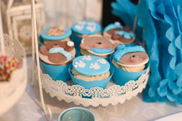istock Sweet table and delicious cakes for first birthday 905689810