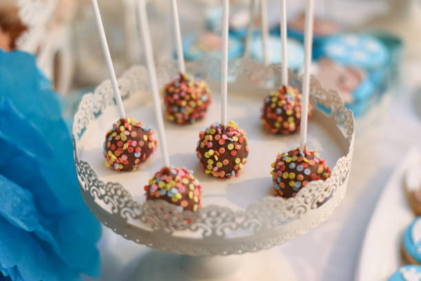 istock Sweet table and delicious cakes for first birthday 905690090