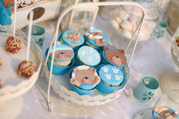 istock Sweet table and delicious cakes for first birthday 905690092