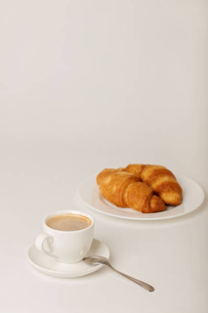 istock Breakfast - coffee with croissants on a white background. 905691570