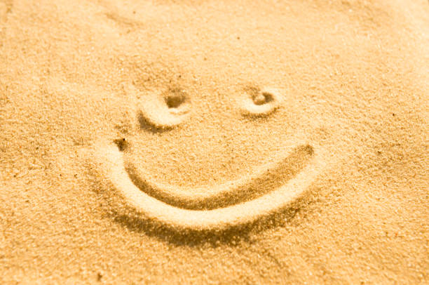 istock Smile on the sand 905691770