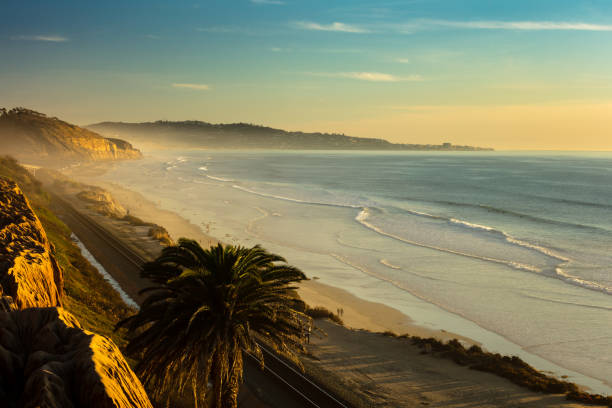 istock Foggy or marine layer, and sunset at San Diego Beach 905694746