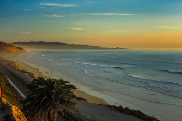istock Foggy or marine layer, and sunset at San Diego Beach 905694748