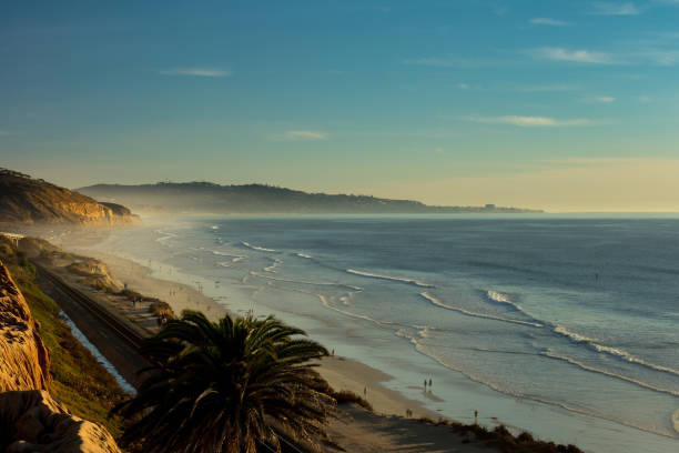istock Foggy or marine layer, and sunset at San Diego Beach 905694792