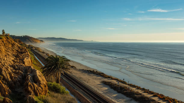 istock Foggy or marine layer, and sunset at San Diego Beach 905694856