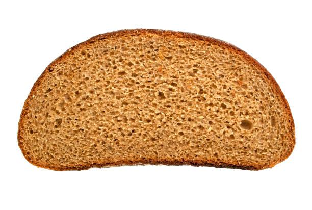 istock Slices of fresh rye bread isolated on white background 905698742