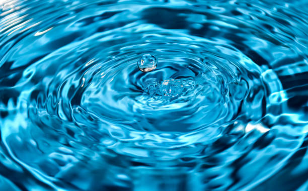 istock A water drop bounces up in a splash. 905698914