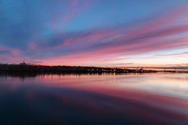 istock sunset glow over river and riversides 905700560