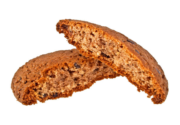 istock Broken cookies with chocolate drops isolated on white background 905703888