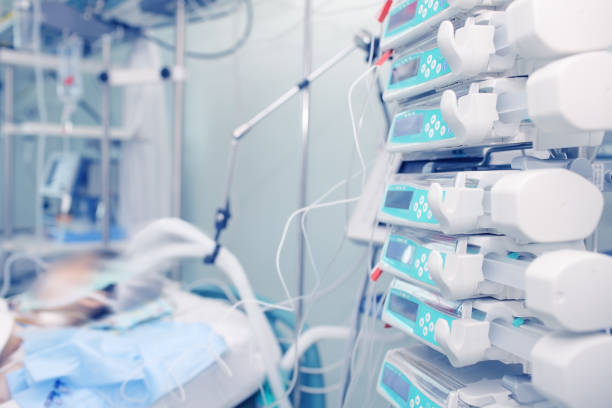 istock Modern equipped ICU room with lying patient 905706250