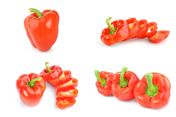 istock Group of red bell peppers isolated on a white cutout 905706552