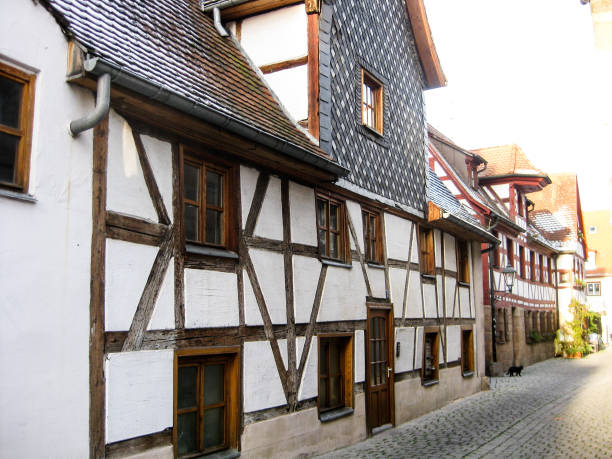 typical Bavarian fachwerk houses, Furth, Germany narrow street in old town of Furth with typical Bavarian fachwerk houses, Germany fuerth stock pictures, royalty-free photos & images