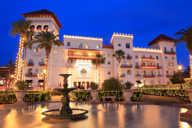 Casa Monica Hotel illuminated at dusk in St. Augustine, Florida St. Augustine, Florida, USA - December24, 2017 : Casa Monica Hotel illuminated at dusk in St. Augustine, Christmas time. Opened in 1888, it is one of the oldest hotels in the United States of America. florida christmas stock pictures, royalty-free photos & images