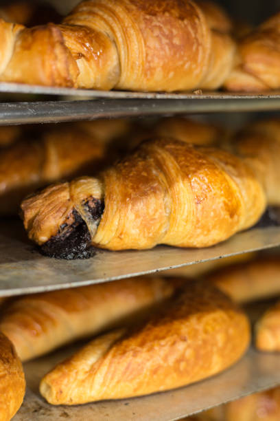 istock baking pastries and bread in an oven at a bakery 905709558