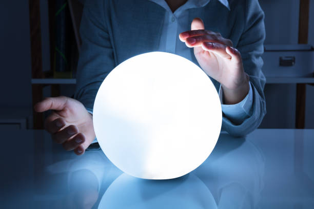 istock Businesswoman Hand On Crystal Ball 905715510