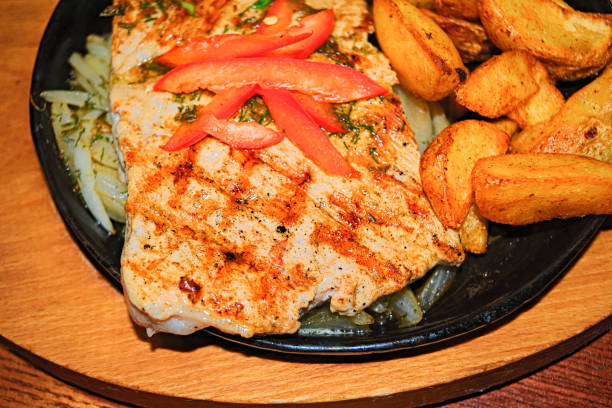 istock Grilled steaks with fries 905715928