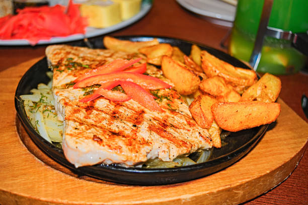 istock Grilled steaks with fries 905718212