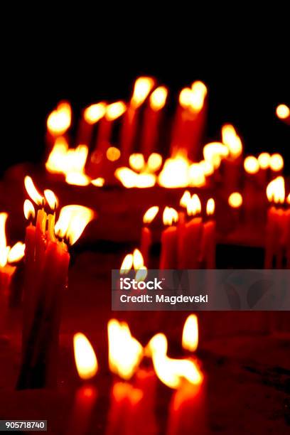 Burning Candles On A Candle Stand In The Church Stock Photo - Download Image Now - Ancient, Atmospheric Mood, Backgrounds