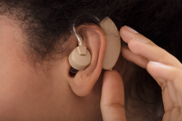 istock Woman Wearing Hearing Aid 905726996