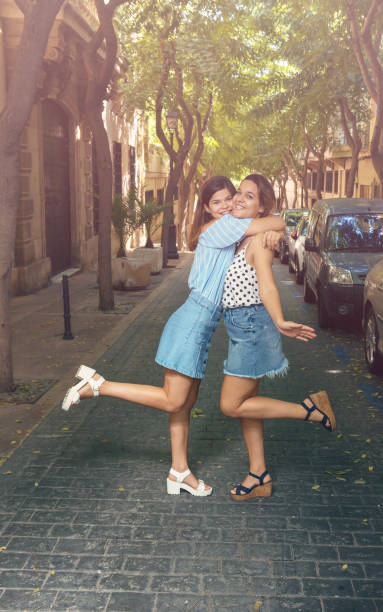 istock two young beautiful girls 905731112