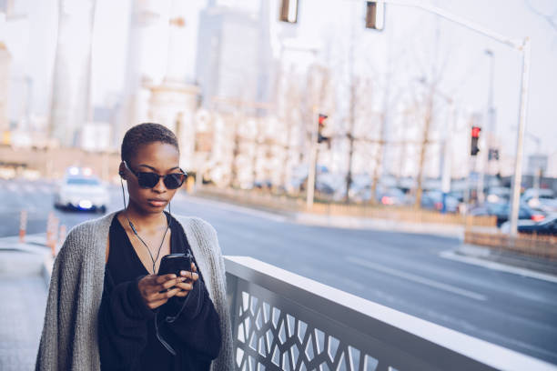istock Woman with headphones 905731740