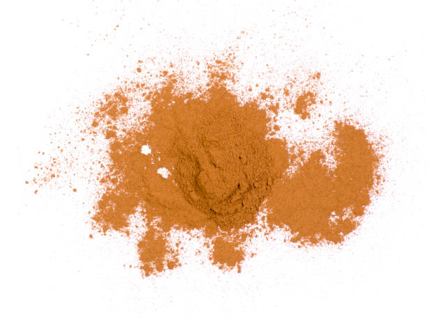 istock Pile of ground cinnamon on a white background 905735422