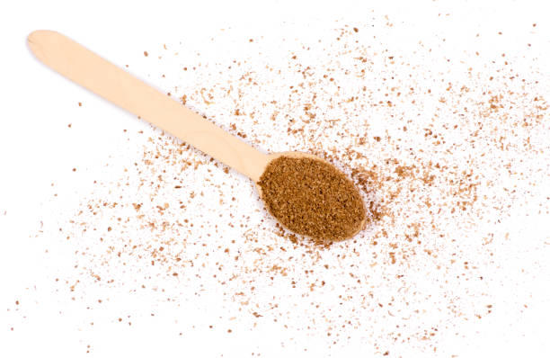 istock Pile coriander seasoning ground on a white background wood spoon 905737992