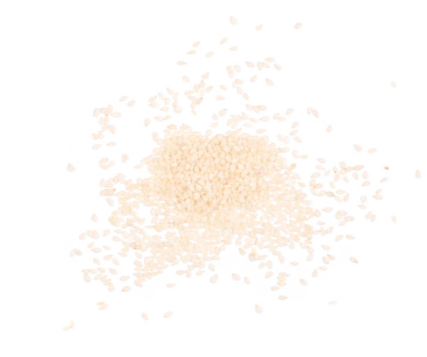 istock Pile of sesame seeds on white background 905738346