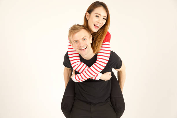 istock Attractive inter racial couple being close together 905754174