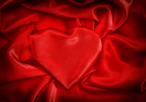istock Love Valentines Day Heart shaped red satin 905754356