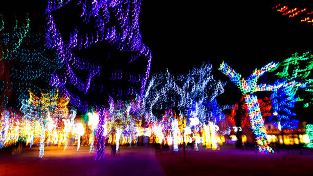 istock Santa Fe, NM: Blurred Christmas Lights in Plaza at Night 905754386