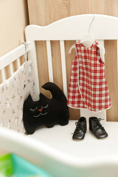 istock Baby outfit in the bedroom 905754894