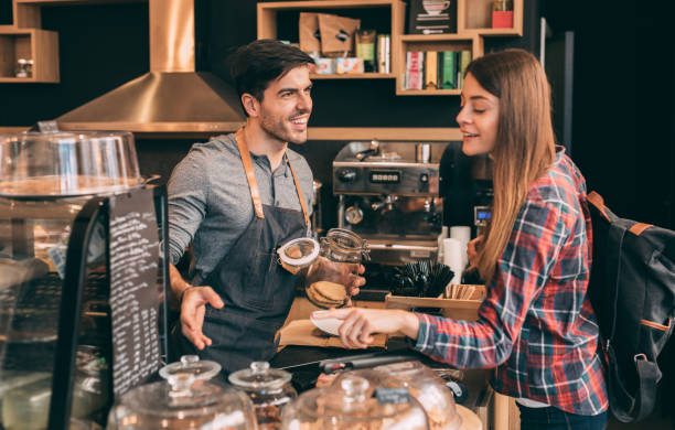 istock Woman buying cookies 905757218
