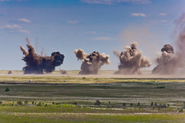 istock Explosion at a military training ground. Destruction of training objectives by aircraft bombs 905757300