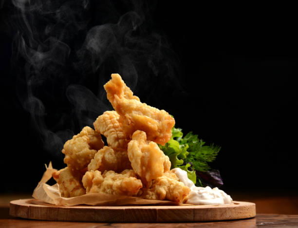 Organic Crispy fish Strips in batter stock photo