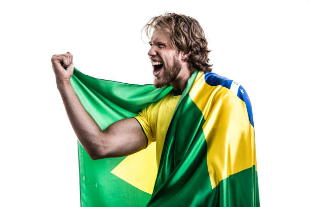 istock Brazilian Fan / Sport Player celebrating on white background 905757832