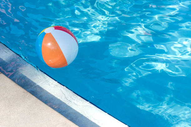 istock Beach Ball in Swimming Pool 905767480