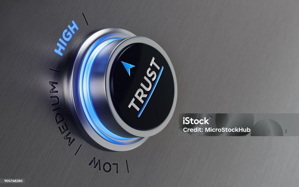 Push Button On Brushed Metal Surface Push button on brushed metal surface. There is trust text and an arrow symbol on the button. The arrow is pointing high text on metal surface. Horizontal composition with copy space and selective focus. Trust Stock Photo