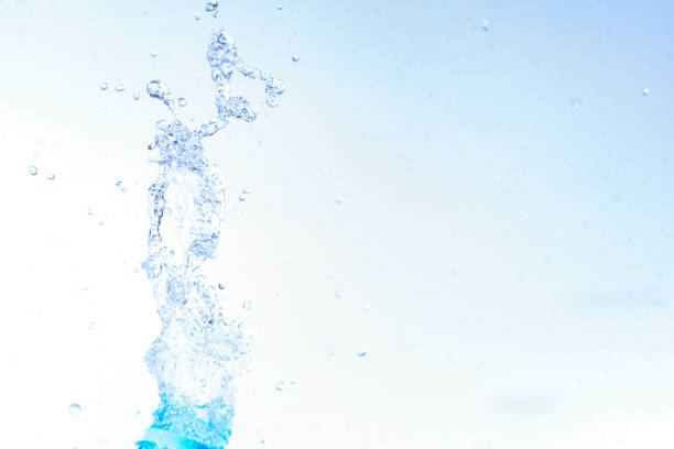 istock Bottle opening with water splashing isolated on white background. 905775208