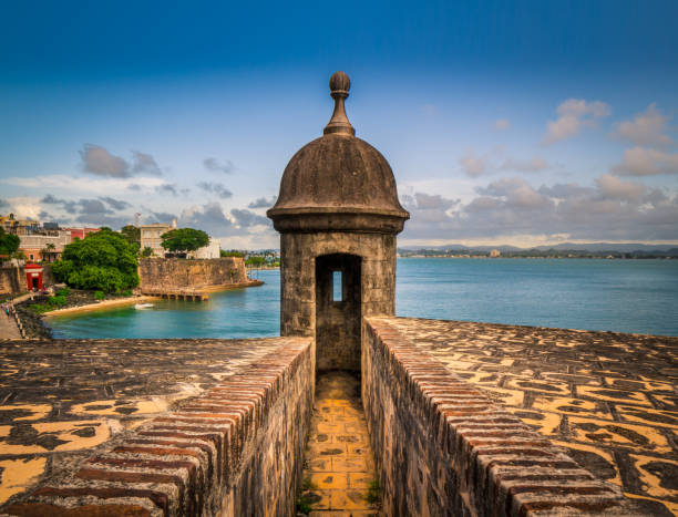 Old San Juan Lookout Tower This "Garita" is located in the historical city of Old San Juan in Puerto Rico's capital. Founded in 1509, this walled city is characterized by its blue cobblestone streets and colonial times structures. The "Garitas" were used as surveillance outposts by the Spanish guards against attacks either by sea or land. puerto rico photos stock pictures, royalty-free photos & images