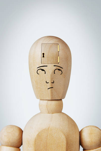 istock Man with a little door in his head 905788560