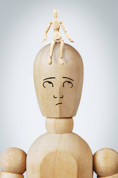 istock Man with a small another man sitting on his head 905788712