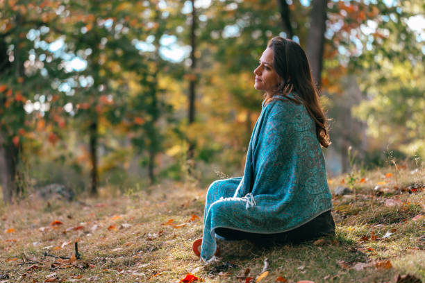 istock Woman with long cloth in forest 905796352