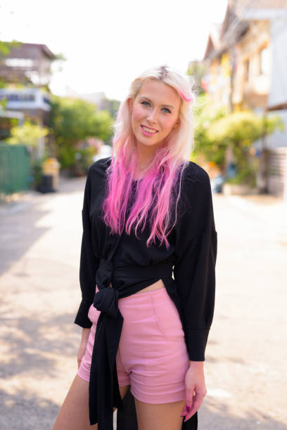 istock Beautiful Young Woman Outdoors With Cool Attitude 905802198