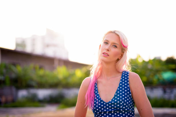 istock Beautiful Young Woman Outdoors With Cool Attitude 905803434