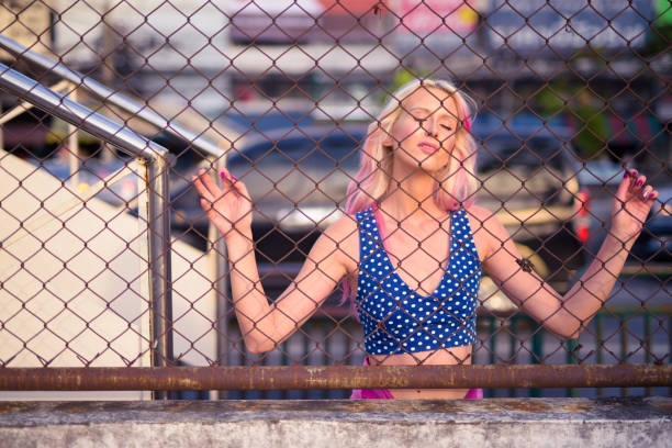 Portrait Of Beautiful Young Woman Outdoors With Cool Attitude