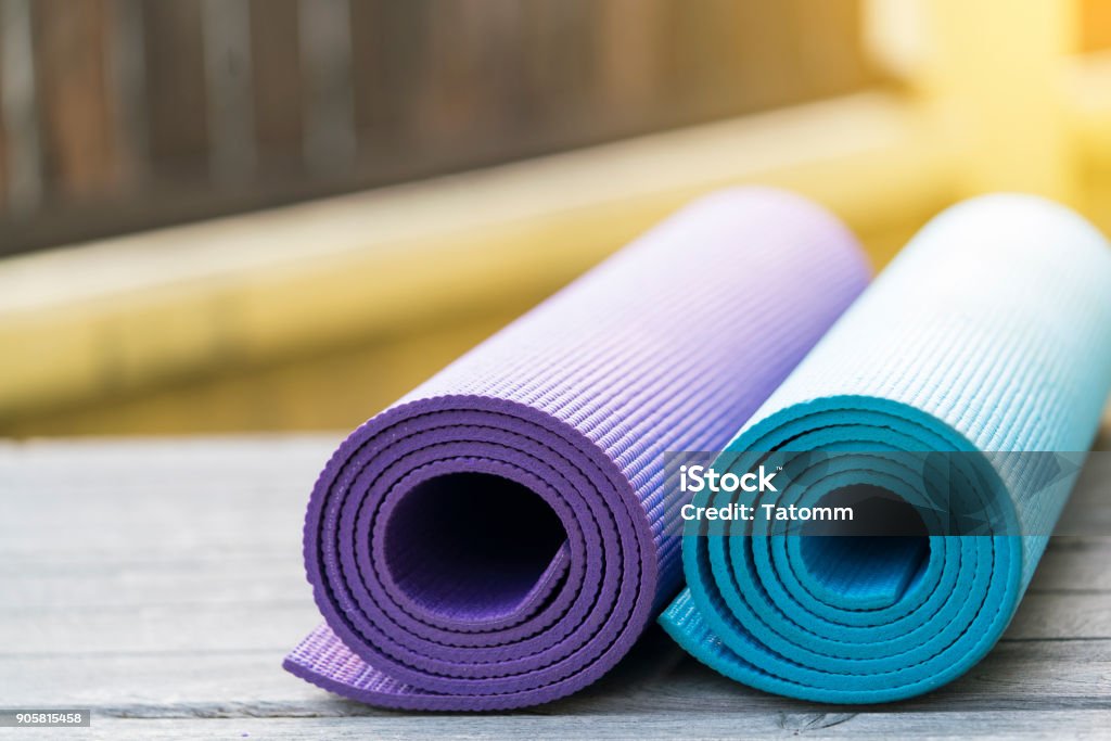 yoga mat on table, fitness healthy and sport concept Blue Stock Photo