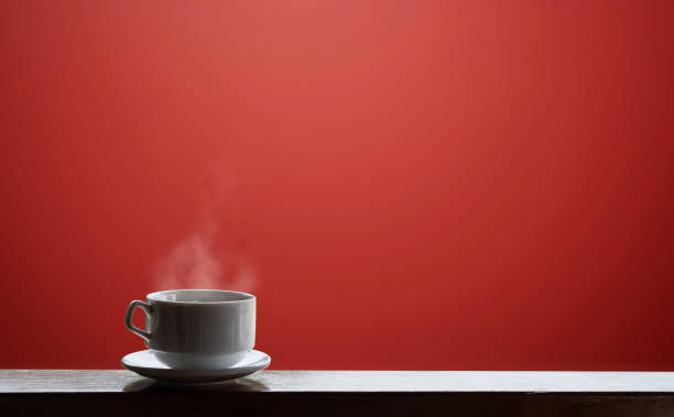 istock Cup of Hot drinks with stream, on red background 905815622