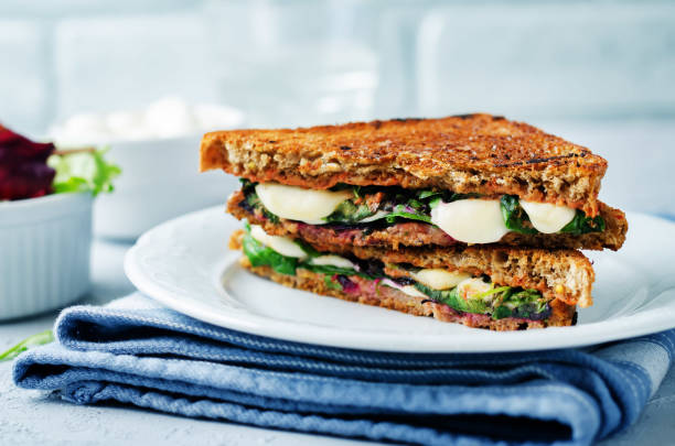 istock Fresh green mozzarella grilled rye sandwich 905816582
